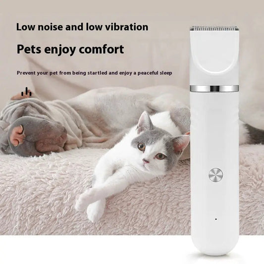 Pet Shaver Electric Clipper in Pearl White next to a relaxed cat and dog, highlighting low noise and vibration for pet comfort.