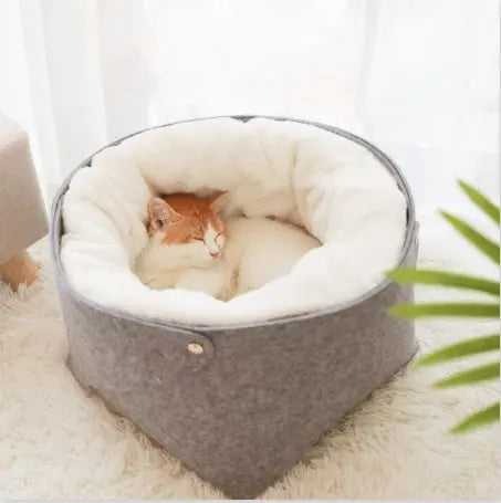 Cozy pet bed with detachable nest, suitable for small to medium cats.