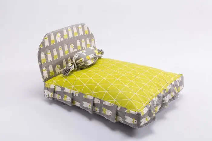 Pet House Puppy Bed with stylish pattern and candy-shaped pillow.