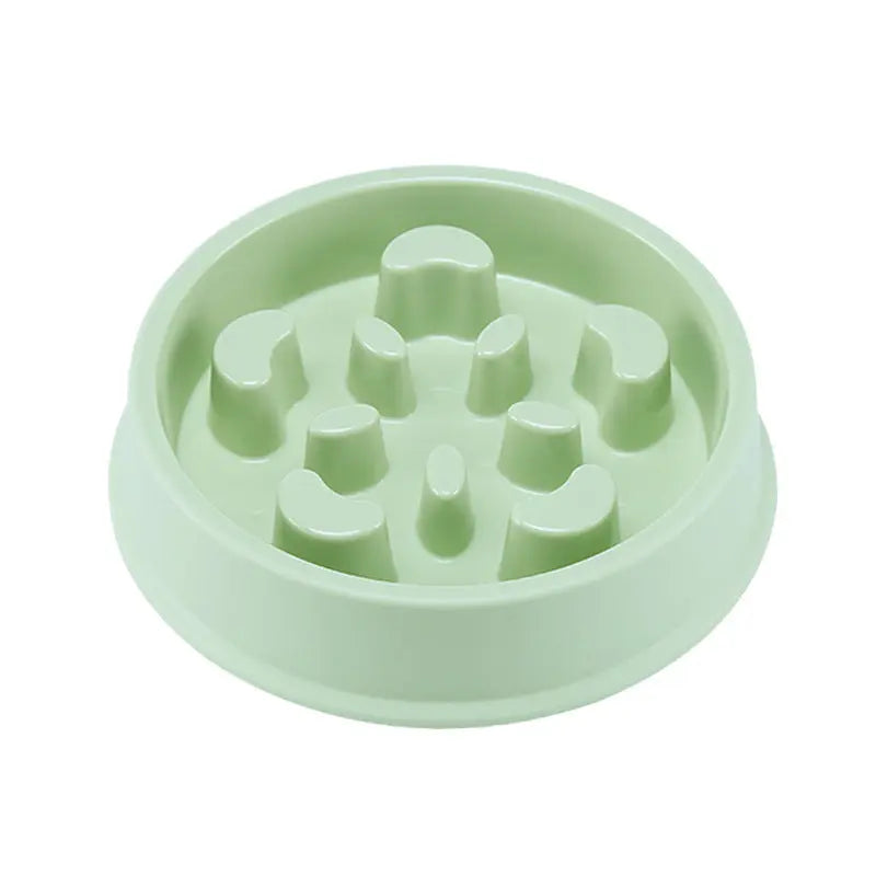 Petal-shaped plastic pet slow feeding bowl in green.