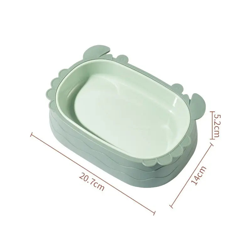 Crab-shaped slow feeding cat bowl, mint green, durable PP material.