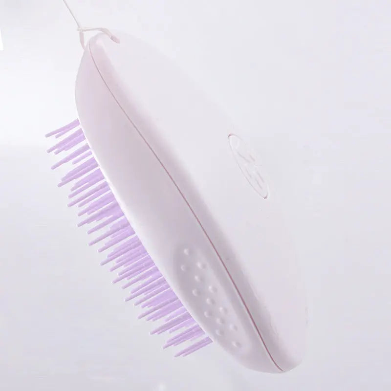 White cat hair brush with purple bristles, made from ABS material.