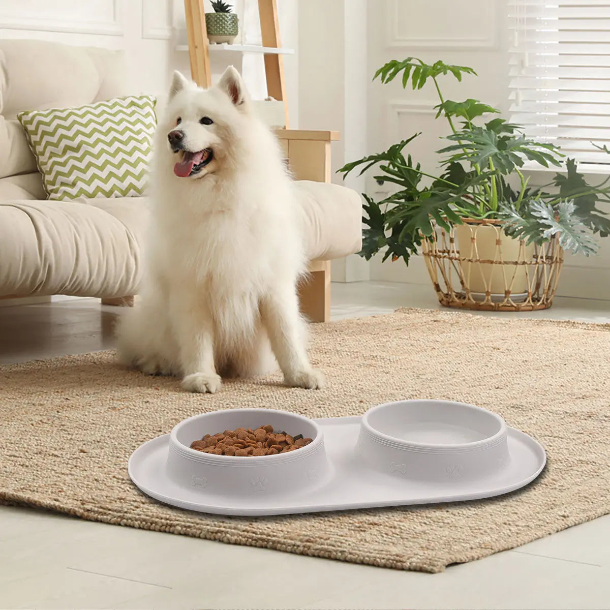 Light gray silicone pet feeding bowl with food, ideal for pets.