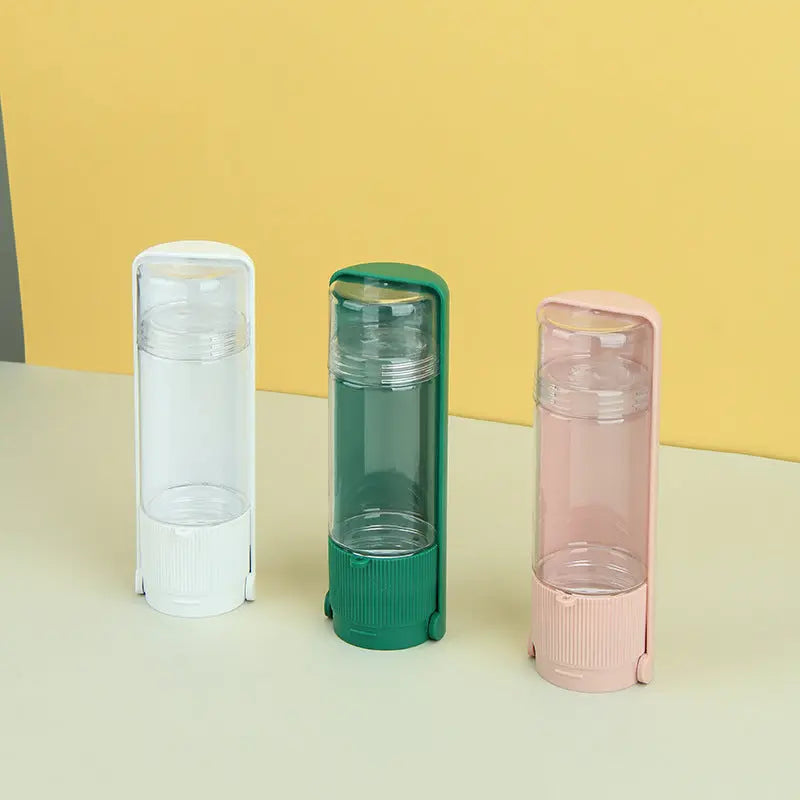 Portable pet water bottles in white, green, and pink.