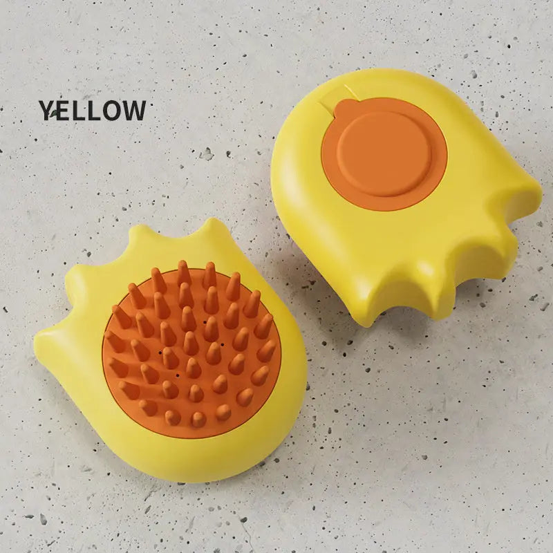 Yellow pet bath brush with massage bristles for cats and dogs.