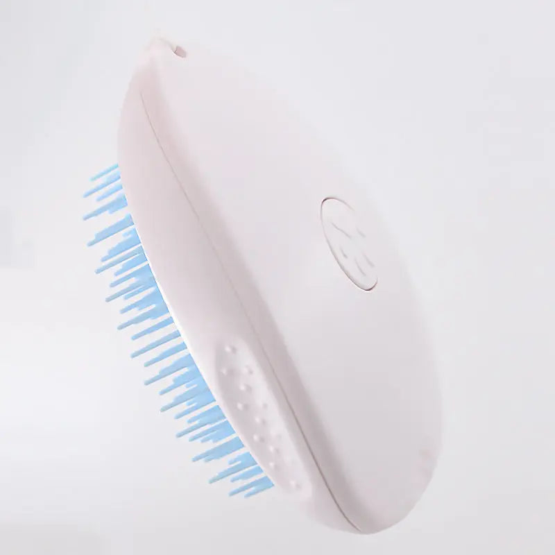 White pet grooming brush with blue bristles for cat hair, made from ABS material.