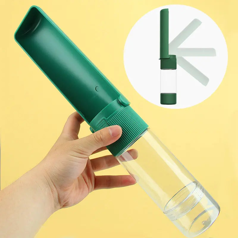 Portable pet water bottle with green drawer-style bowl, ideal for travel.